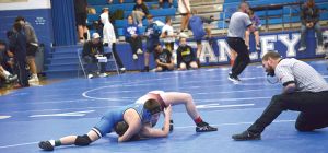 Wrestlers In Action In Duals And Tournaments