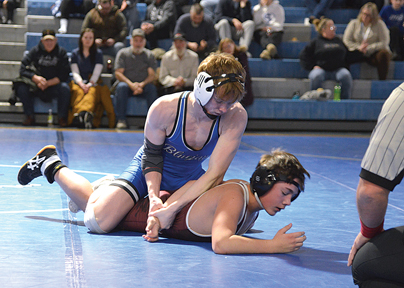 Wrestlers Host Duals, In Tourney Action